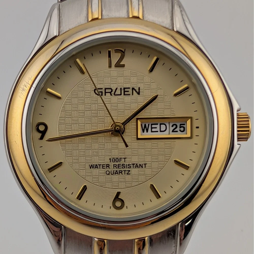 Gruen GU1177‎ Mens Quartz Day Date Watch Two Tone Gold Silver Textured Dial